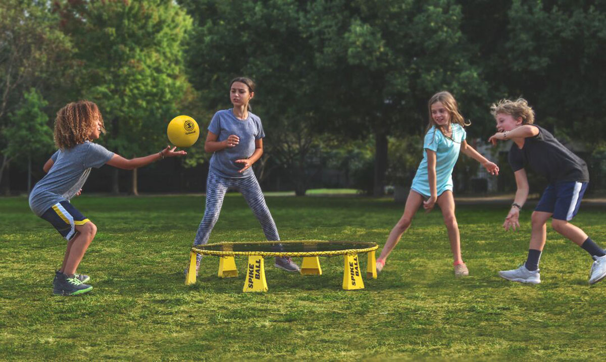Spikeball TITAN roundnet set with yellow circular net and balls